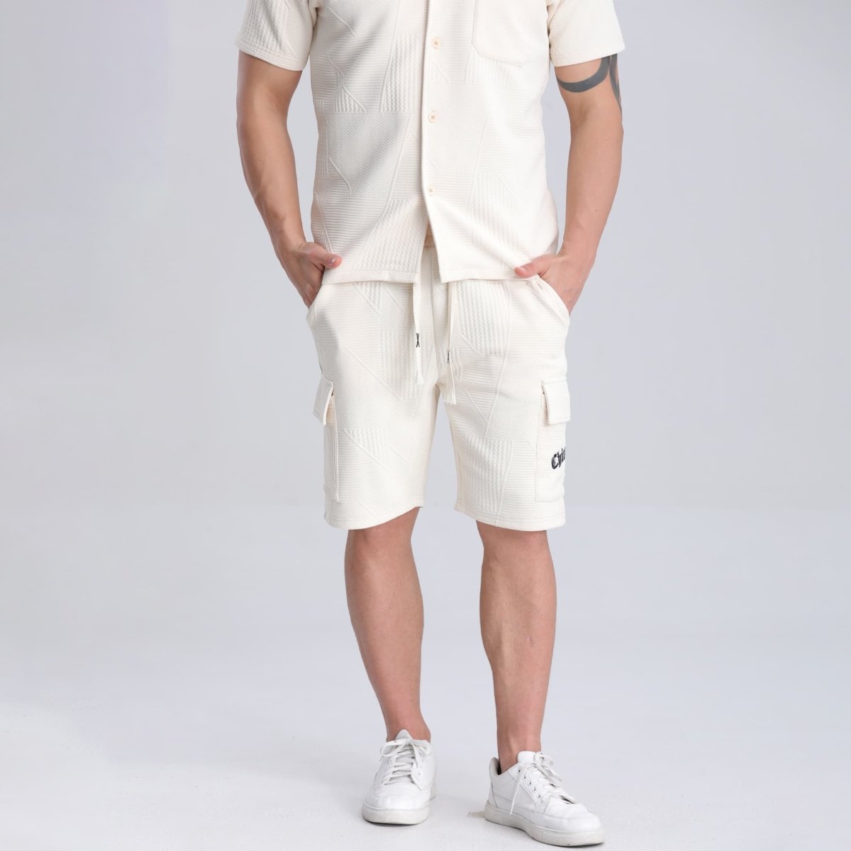 Pantalones cortos deportivos para hombre, ligeros, con estampado bordado y bolsillos inclinados para entrenar en el gimnasio.