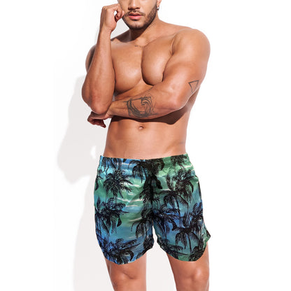 dark green coconut tree board shorts for men